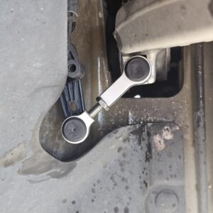 Plaid front adjustable link